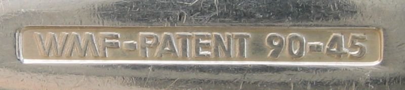 Photograph: 90 plating mark struck on a silver-plated place setting