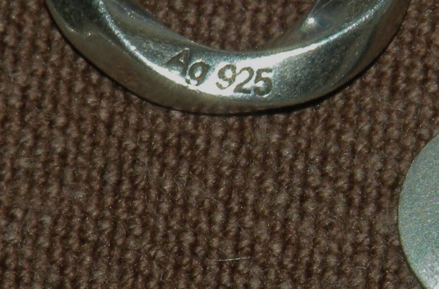 Photograph: 925 fineness hallmark struck on a silver necklace clasp